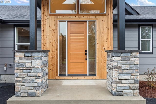31248 Valley View Ln, Cottage Grove, OR 97424 - view of exterior entry with a shingled roof and stone siding