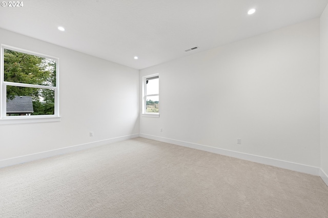 view of carpeted spare room