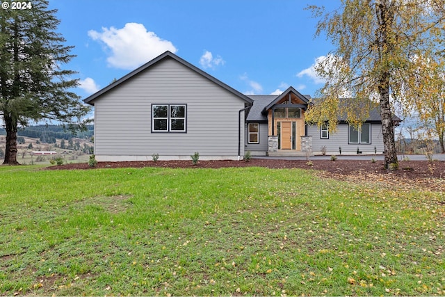 view of front of house with a front yard