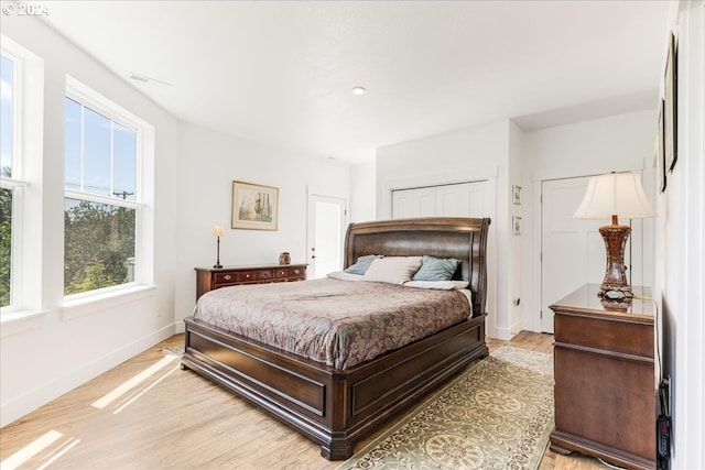 bedroom with light hardwood / wood-style flooring