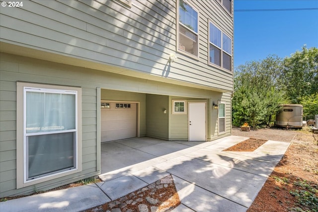 exterior space with a garage