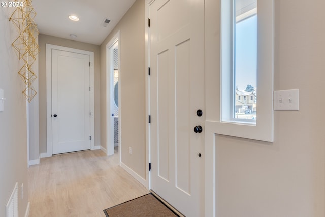 entrance foyer with light wood-type flooring