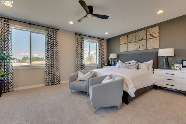 carpeted bedroom with a ceiling fan, recessed lighting, and baseboards