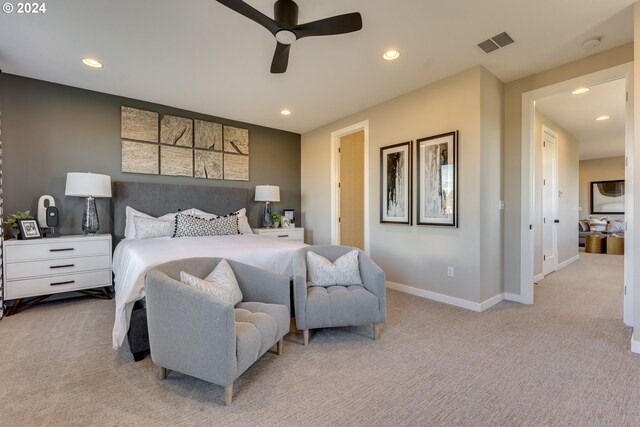 bedroom with visible vents, light carpet, a ceiling fan, recessed lighting, and baseboards