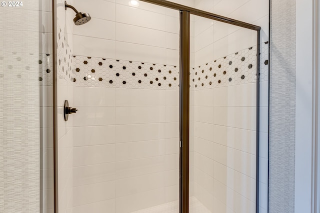 full bath featuring a stall shower