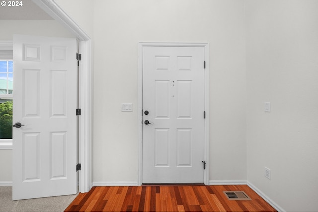 foyer featuring hardwood / wood-style floors