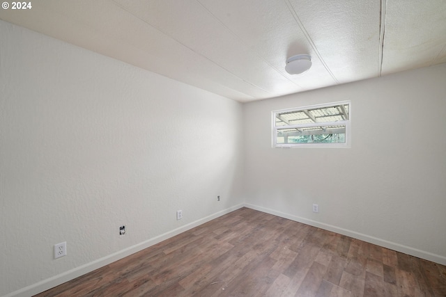 unfurnished room featuring wood-type flooring