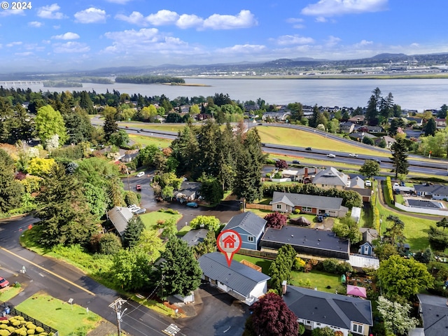 drone / aerial view with a water view