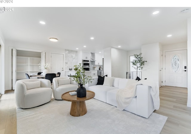 living room featuring light wood-type flooring