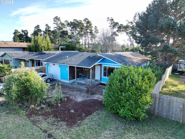 view of front of home featuring a garage