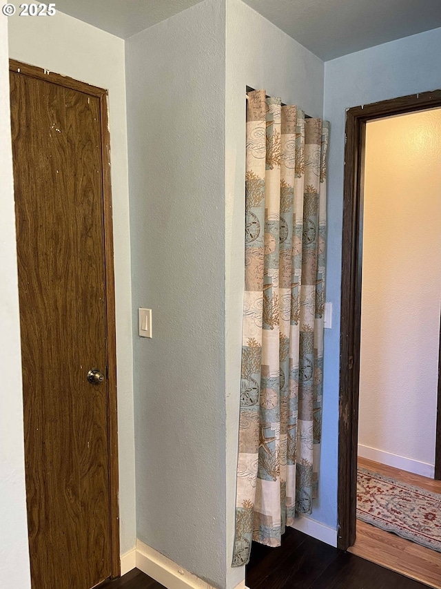 bathroom featuring wood-type flooring