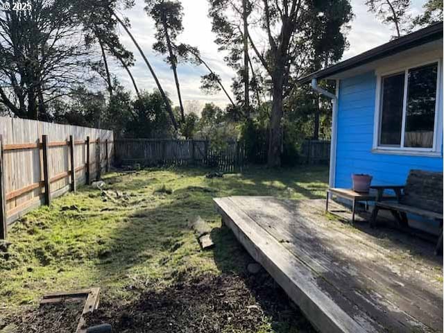 view of yard featuring a deck