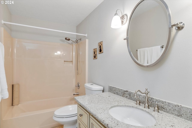 full bathroom with vanity, bathtub / shower combination, and toilet