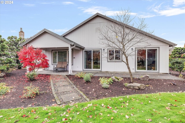 rear view of property with a patio area