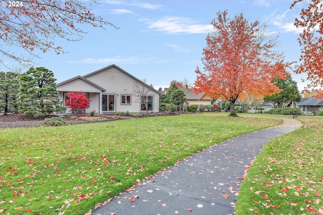 view of front of home with a front yard