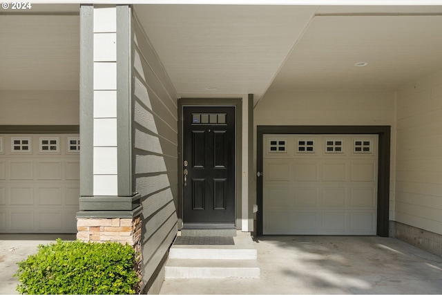 property entrance featuring a garage