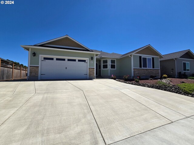 ranch-style home featuring a garage