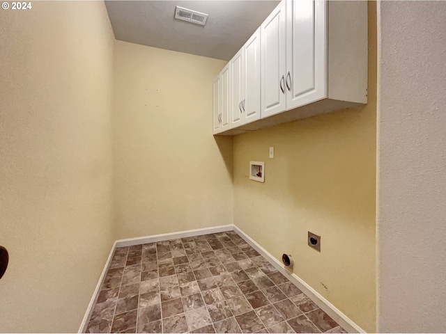 laundry area featuring cabinets, hookup for a washing machine, and electric dryer hookup