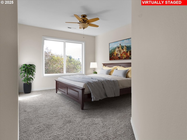 bedroom featuring visible vents, carpet flooring, a ceiling fan, and baseboards