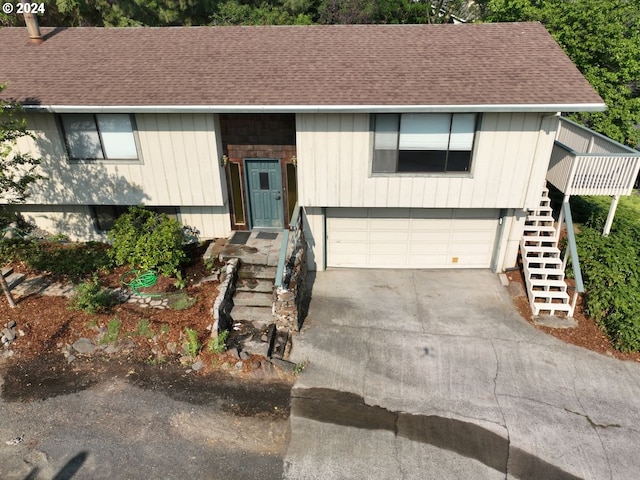 raised ranch featuring a garage