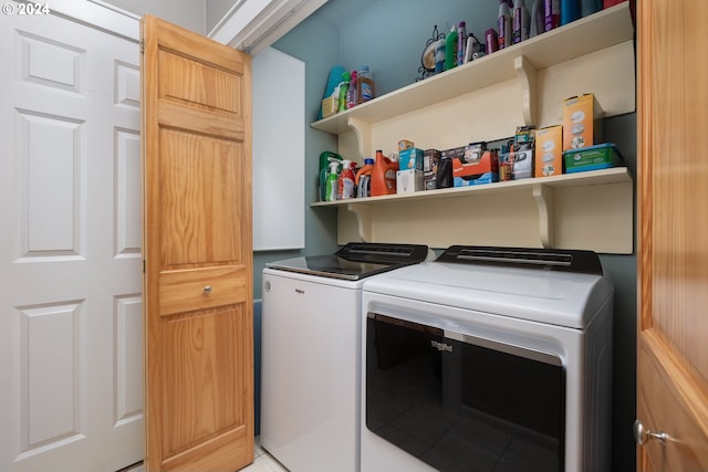 laundry area featuring laundry area and separate washer and dryer