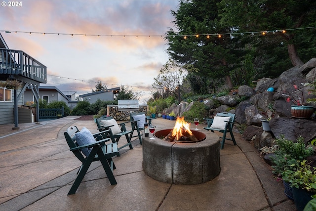 view of patio / terrace featuring a fire pit and area for grilling