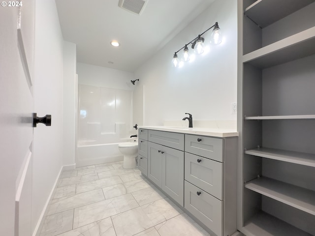 full bathroom with tile patterned floors, vanity, bathing tub / shower combination, and toilet