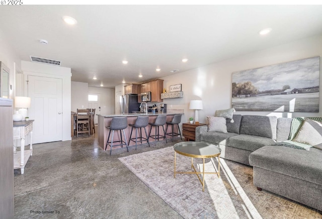 967 NE 11th St, Hermiston, OR 97838 - living area with recessed lighting and finished concrete floors