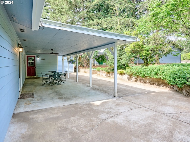 view of patio / terrace featuring a carport