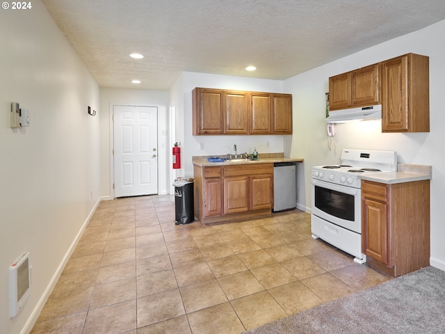 kitchen with stainless steel dishwasher, light tile patterned flooring, sink, and white range