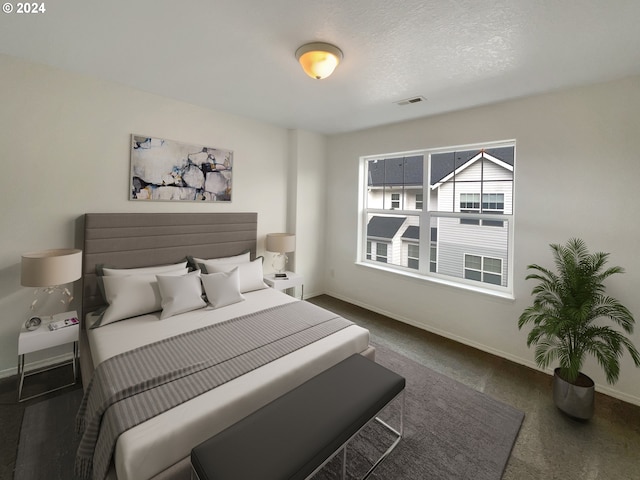 bedroom with a textured ceiling