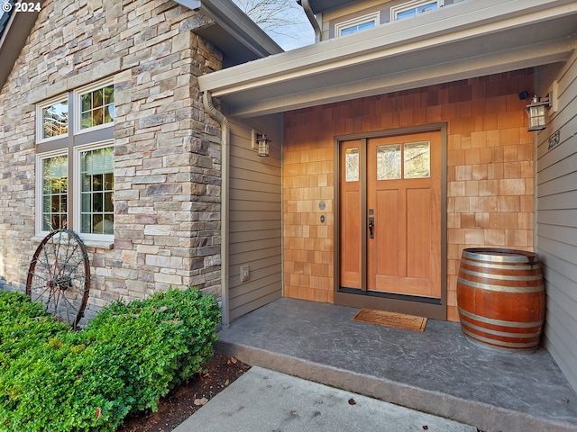 property entrance featuring a porch