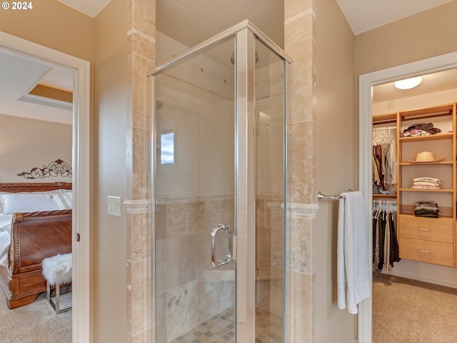 bathroom with a shower with shower door