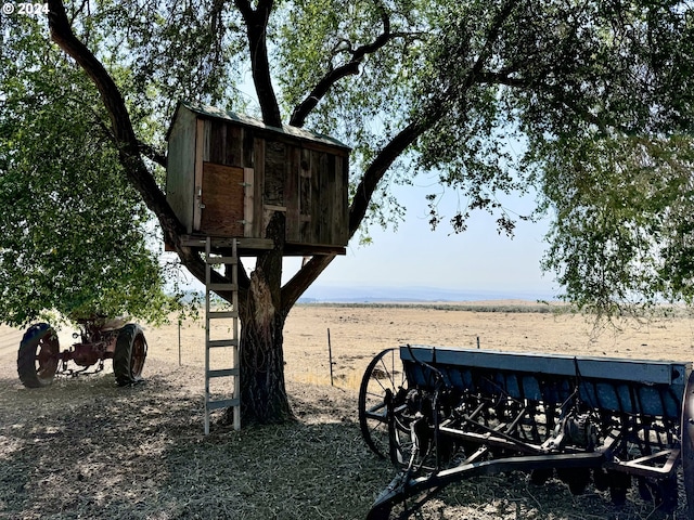 view of community with a rural view