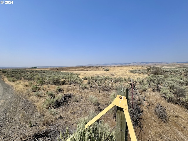 view of mountain feature featuring a rural view