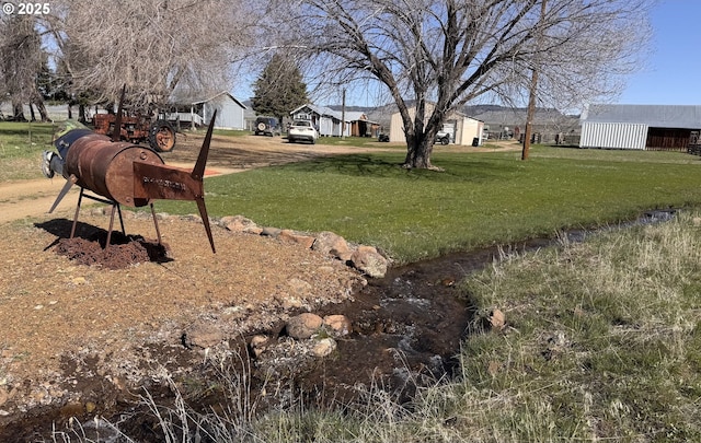 27877 Skinner Ln, Baker City, OR 97814 - yard at dusk featuring a rural view and a mountain view