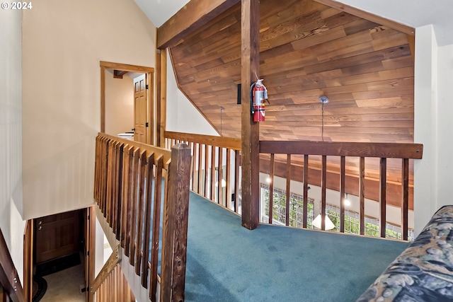 interior space with carpet floors and high vaulted ceiling