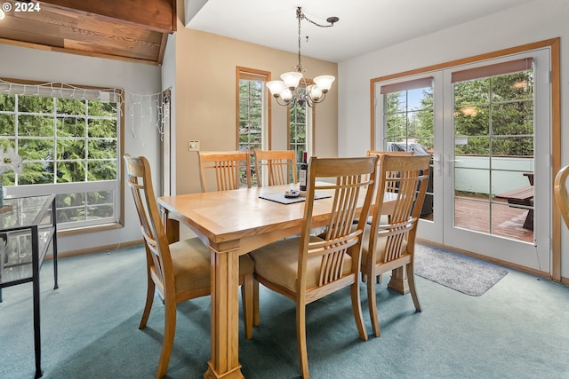 dining area featuring carpet flooring, french doors, beamed ceiling, and a chandelier