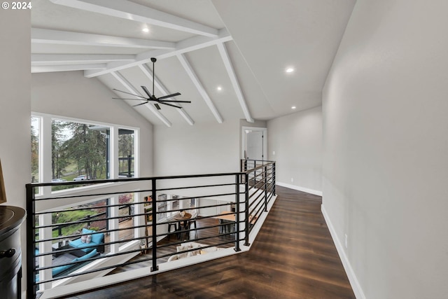 hall featuring vaulted ceiling with beams and dark hardwood / wood-style flooring