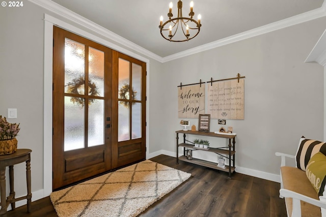 entryway featuring a chandelier, french doors, dark hardwood / wood-style floors, and crown molding