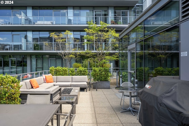 view of patio / terrace featuring area for grilling and an outdoor hangout area