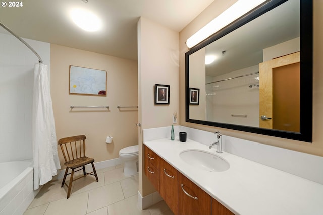 full bathroom featuring tile patterned flooring, vanity, toilet, and shower / bath combo with shower curtain