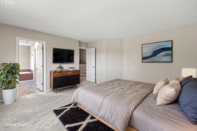 5393 SW Wichita St, Tualatin, OR 97062 - bedroom with light colored carpet, a textured ceiling, and connected bathroom