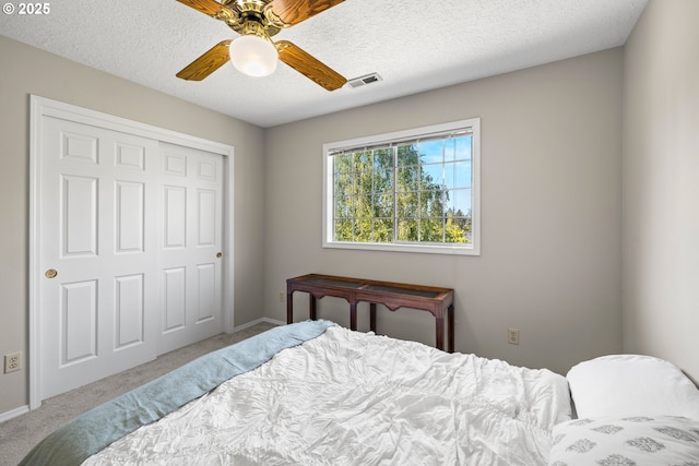 5393 SW Wichita St, Tualatin, OR 97062 - bedroom featuring carpet floors, a closet, baseboards, ceiling fan, and a textured ceiling