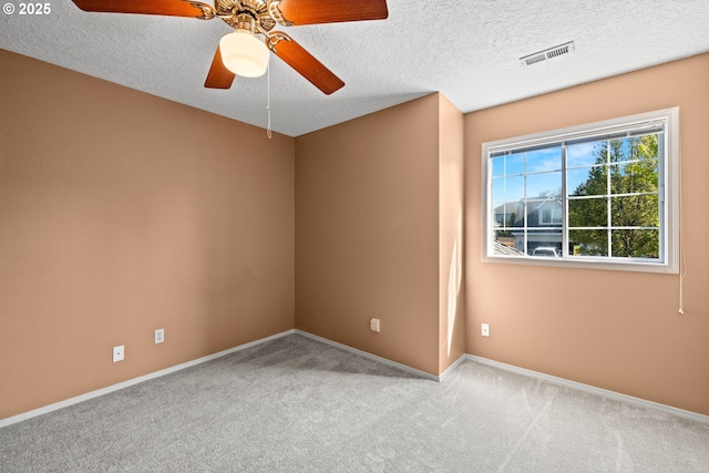 5393 SW Wichita St, Tualatin, OR 97062 - carpeted spare room featuring baseboards, ceiling fan, and a textured ceiling