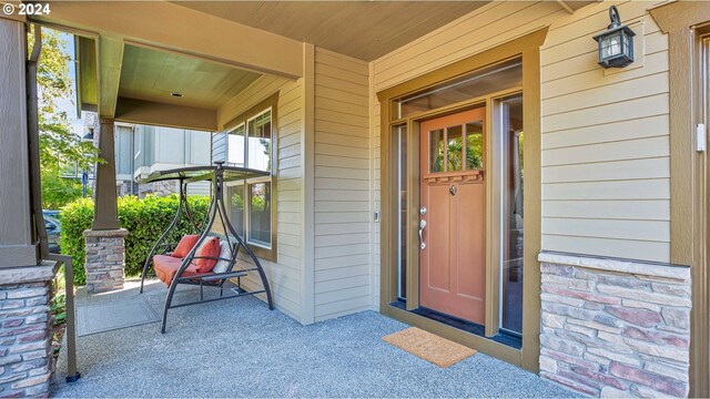 entrance to property with a porch