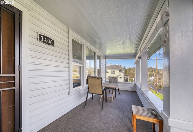 exterior space with wooden ceiling