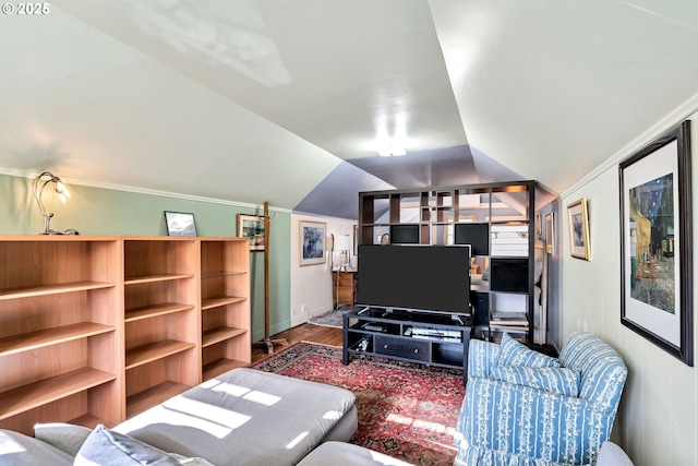 living room featuring hardwood / wood-style floors and vaulted ceiling