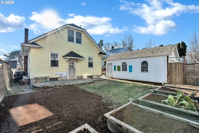 back of property featuring a patio