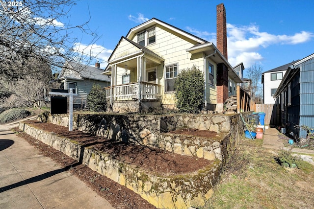 bungalow-style home with a porch